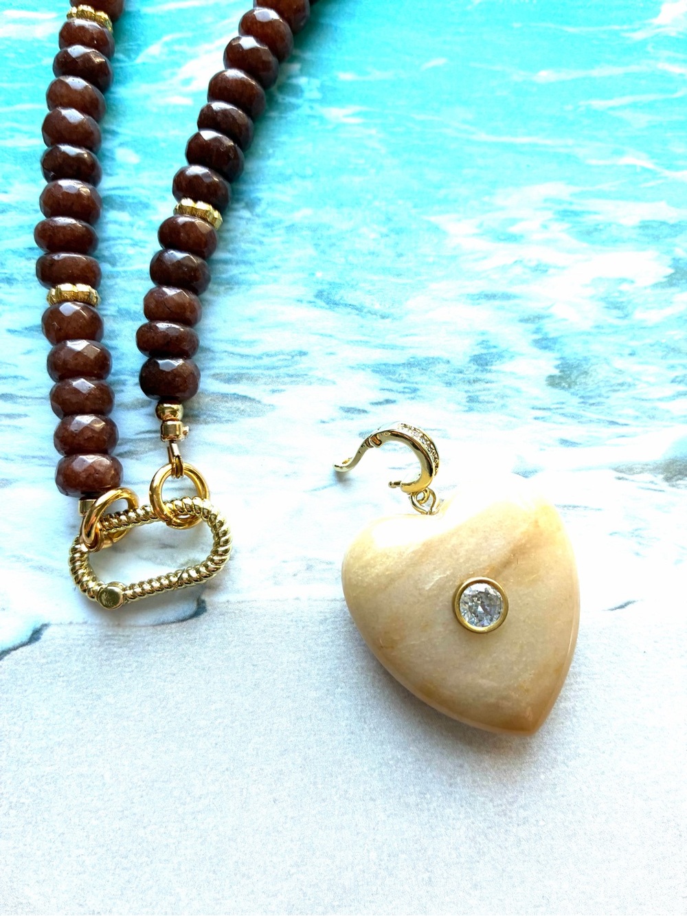 Chocolate Sunstone Rondelle Necklace with Gold-Plated Heart Pendant.